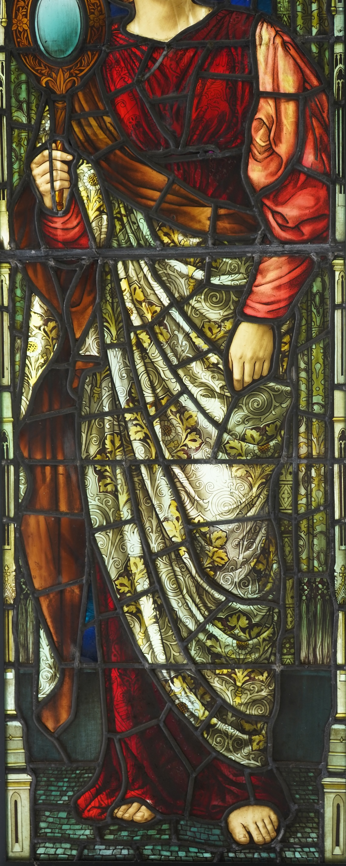 Attributed to Henry Holiday (1839-1927) for James Powell & Son: A stained and painted glass panel of a martyr